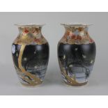 A pair of Japanese pottery vases both decorated with a nighttime scene of fireflies amongst branches