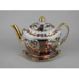A Barr Flight & Barr Worcester porcelain Japan pattern teapot and stand, with floral decoration