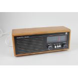 A Roberts RM30 radio in teak case