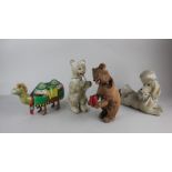 Two Russian clockwork plush covered bears drinking 25cm high (one with key), together with a