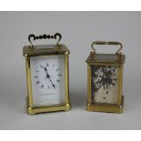 A Schatz brass cased carriage clock the white enamel dial and Roman numerals, striking on a bell,