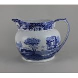 A large Spode blue and white jug decorated with the Italian pattern 23cm high