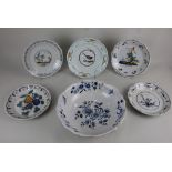 A collection of French faience pottery to include two plates, believed Nevers, largest 23.5cm