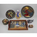 A collection of French Quimper carved wood polychrome decorated items, some indistinctly signed P