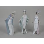 Three Lladro porcelain figures of 1920s ladies, 'BSophisticate', 'The Flirt', and 'Talk of the