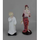 A Royal Doulton figure of a child 'Darling' 20.5cm high, together with a Regency Fine Arts figure '