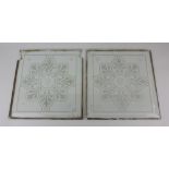 A pair of etched and cut clear glass panels 34.5cm by 32cm (a/f)
