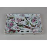 A Chinese Cantonese famille rose porcelain tray decorated with birds, butterflies, flora and fauna