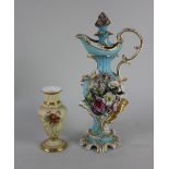 A 19th century porcelain flask and stopper, probably Derby, with floral encrusted decoration on