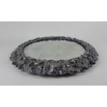 A late 19th / early 20th century silver plated circular mirrored wedding cake stand with