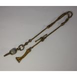 A 9ct gold ladies watch chain 8g and a watch key mounted with a chalcedony