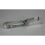 A pair of Victorian silver asparagus servers pierced flat rectangular blades with Kings pattern