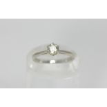 A diamond solitaire ring, claw set with a round brilliant cut diamond (approx 0.5ct), in 18ct