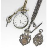 A silver watch chain and two silver medals, both engraved, one for bowling dated 1910, 1.6oz,