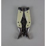 A German novelty ladies legs pocket corkscrew with ivory stockings, see Ferd Peters and Bert