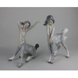 A pair of Lladro porcelain boy and girl centaur figures tallest 22cm high