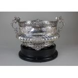 A large Victorian silver two-handled rose bowl renaissance revival style with embossed cornucopia,