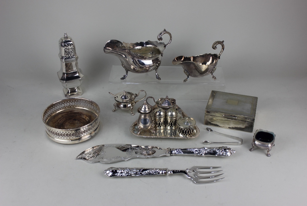 A collection of silver plated tableware to include two sauce boats, sugar castor, three-piece