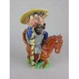 A Clarice Cliff Newport Pottery Don Quixote character jug 25.5cm high