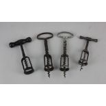Four late 19th century German spring corkscrews including one with nickel loop handle, see Bull's