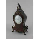 A late 19th century French boulle mantle clock circular dial with Roman numerals 30cm high