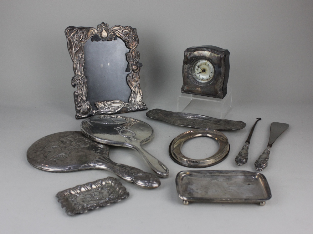 Two early 20th century dressing table hand mirrors silver mounted photograph frame, silver mounted