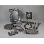 Two early 20th century dressing table hand mirrors silver mounted photograph frame, silver mounted