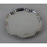 A modern silver salver lobed piecrust border on three hoof feet, maker Cooper Brothers & Sons,