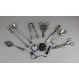 An Edward VII silver caddy spoon and a collection of assorted silver servers to include a pair of