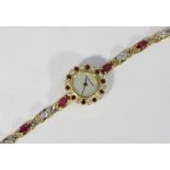 Bueche Girod, a lady's ruby and diamond bracelet watch with round brilliant cut diamond and circular