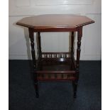 A Victorian mahogany side table octagonal top with moulded edge on turned supports joined by a