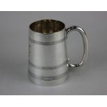 A late Victorian silver christening mug tapered form with line banding, maker James Charles Jay,