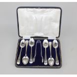 A set of six Edward VII silver teaspoons and and sugar tongs with engraved initial maker Walker