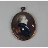 A 19th century oval head and shoulders miniature portrait profile of a Navy officer verso later
