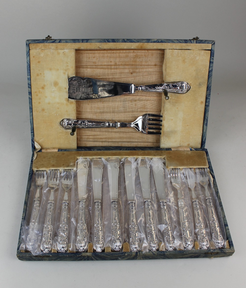 A cased set of six pairs of George V silver handled Kings pattern fish knives and forks and a pair