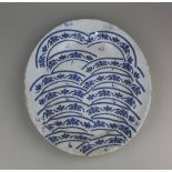 A blue and white transfer printed trial platter, with annotations beside repeat border sections,