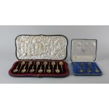 An Edward VII cased set of twelve silver gilt annoiting spoons makers James Wakely & Frank Clarke