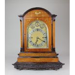 A large Victorian inlaid musical Westminster chime bracket clock with carved bracket stand, the