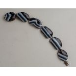 A silver and banded agate bracelet