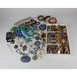 A quantity of silver and costume jewellery to include rings, necklaces, brooches etc