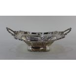 A Victorian silver plated two-handled pedestal dish with shell and scroll gadrooned border and