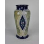 A Royal Doulton glazed stoneware vase by Bessie Newberry, with tubelined decoration of flowers