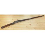 A Torador type matchlock musket 89cm barrel with iron ramrod, stamped 3123
