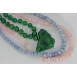 A carved jade dragon pendant bead necklace, 60cm with two opal bead necklaces, pink and blue, both