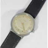 A gentleman's Cyma steel wrist watch retailed by J W Benson, on leather strap