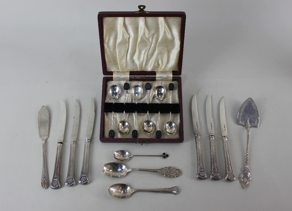 A cased set of six George VI silver coffee spoons with bean terminals, a Victorian silver cake