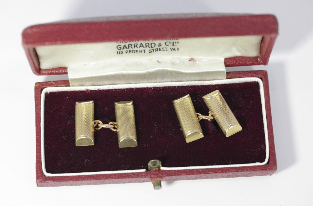 A pair of mid-20th century 9ct gold cufflinks rectangular textured form, maker E&G London 1961, in