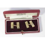 A pair of mid-20th century 9ct gold cufflinks rectangular textured form, maker E&G London 1961, in