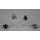 A silver and tiger's eye ring, a silver and agate ring and two costume jewellery rings