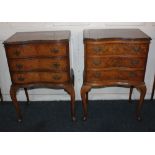 A near pair of reproduction walnut serpentine front bedside chests each with three drawers on